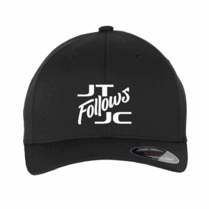 Unisex Flexfit hat with “JT Follows JC” Christian apparel design, solid black, fitted S/M & L/XL